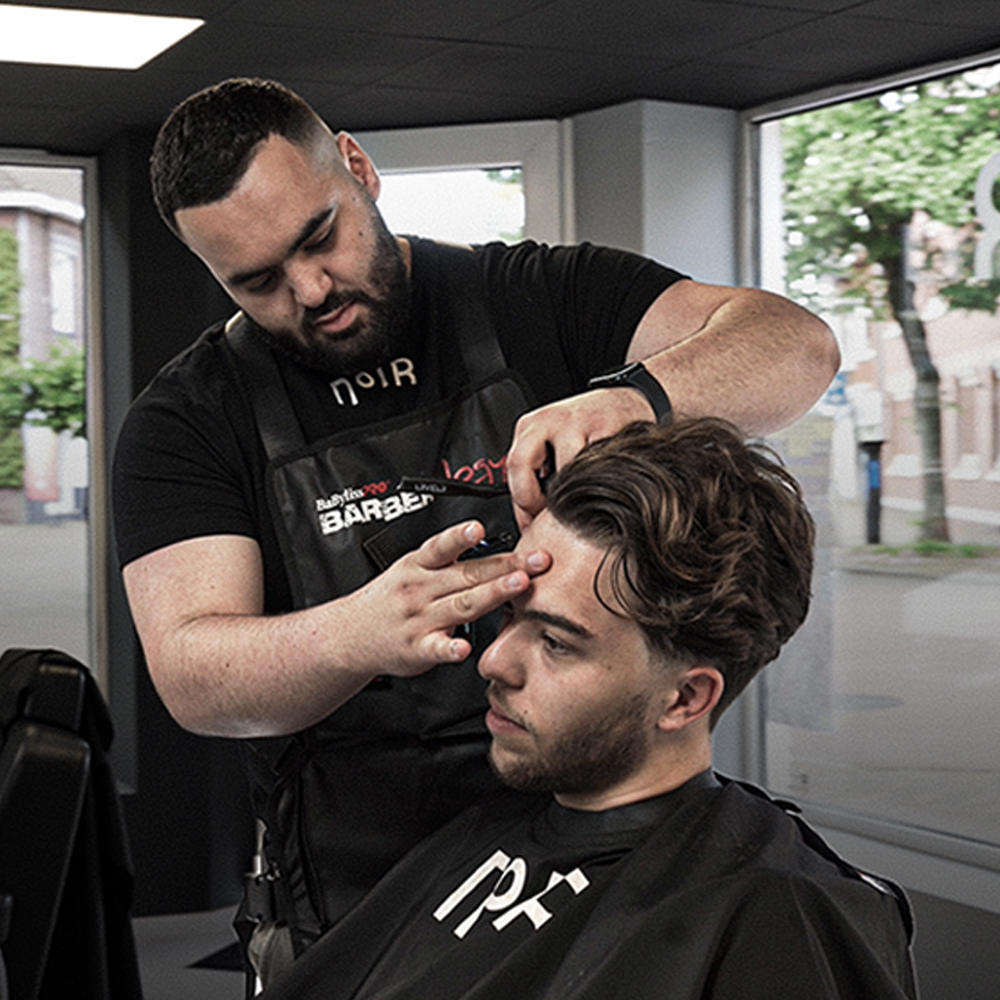 Ilker, de instructeur bij Noir Barber Academy